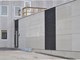Den grå facade med træbeklædning over vinduerne på Flexicubes® modulerne som er opstillet ved Envases Europe
